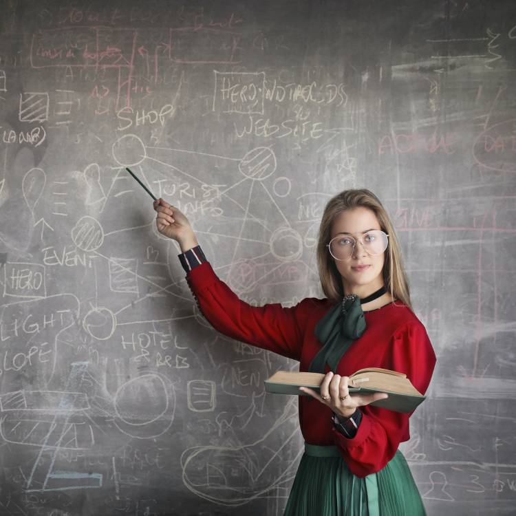 Woman with a blackboard showing complex instructions